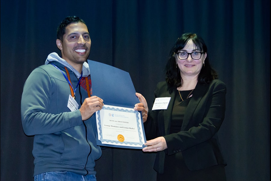 Photo of George Montañez Receiving Award